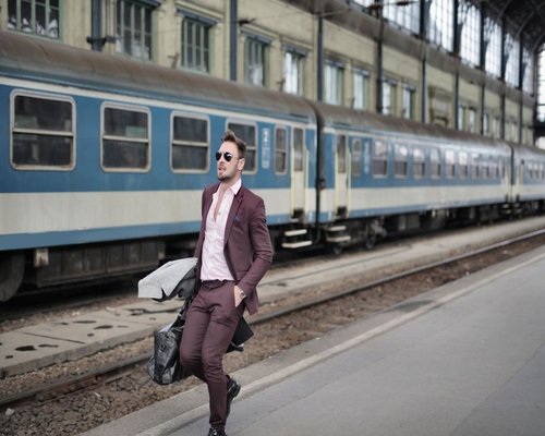 Commuter waiting for public transport maintaining good posture